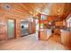 Modern kitchen with stainless steel appliances and an island with granite countertops at 408 Crestview Dr, Las Vegas, NV 89124