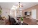 Living room with hardwood floors, sectional sofa and TV at 4585 Sonia Rose Ln, Las Vegas, NV 89122