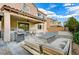 Pool, fire pit, and covered patio with seating at 201 White Mule Ave, Las Vegas, NV 89148