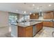 Modern kitchen with large island, stainless steel appliances, and granite countertops at 201 White Mule Ave, Las Vegas, NV 89148