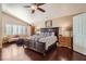 Main bedroom with hardwood floors and a sitting area at 2112 Marble Gorge Dr, Las Vegas, NV 89117