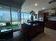 Modern kitchen with dark wood cabinets and city views at 4575 Dean Martin Dr # 2907, Las Vegas, NV 89103