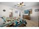 Primary bedroom with large TV and wooden dresser at 1047 Atkins Ln, Mesquite, NV 89027