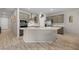 Modern kitchen with gray cabinets and island at 1047 Atkins Ln, Mesquite, NV 89027