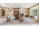 Elegant living room featuring a fireplace and ornate furniture at 9517 Verlaine Ct, Las Vegas, NV 89145