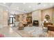 Spacious living area with high ceilings and a view of the entryway at 9517 Verlaine Ct, Las Vegas, NV 89145