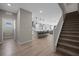 Bright entryway with hardwood floors and staircase view at 1388 Mariposa Way, Mesquite, NV 89027