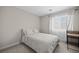 Cozy bedroom featuring a patterned comforter and built-in shelving at 1388 Mariposa Way, Mesquite, NV 89027