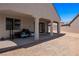 Covered patio with space for grilling and entertaining at 1388 Mariposa Way, Mesquite, NV 89027