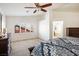 Main bedroom with ensuite bathroom and window with shutters at 850 Buffwood Ave, Las Vegas, NV 89123