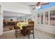 Bright breakfast nook boasts a yellow checkered table and pool view at 850 Buffwood Ave, Las Vegas, NV 89123