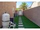 Pool equipment and artificial turf pathway at 850 Buffwood Ave, Las Vegas, NV 89123