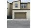 Attached garage with modern door and ample parking space at 11394 Ethereal Landing Ave, Las Vegas, NV 89138