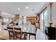 Well-lit kitchen with an island and plenty of cabinet space at 3881 Burma Rd, North Las Vegas, NV 89032