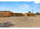 Gravel side yard with covered patio and shed at 101 S Royalite St, Sandy Valley, NV 89019