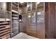 Large walk-in closet with built-in shelving and drawers at 4231 San Alivia Ct, Las Vegas, NV 89141