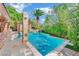 Resort-style pool with a waterfall feature at 4231 San Alivia Ct, Las Vegas, NV 89141