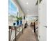 Bright entryway with glass-top console table and plants at 63 Harrison Rose Ct, Las Vegas, NV 89110