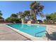 Inviting community swimming pool with surrounding fence at 63 Harrison Rose Ct, Las Vegas, NV 89110