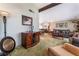 Living room with a view into dining room and staircase at 4415 Flowerdale Ct, Las Vegas, NV 89103