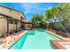 Inviting pool with brick coping and spacious deck at 4415 Flowerdale Ct, Las Vegas, NV 89103