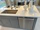 Kitchen island with sink and dishwasher at 4582 Cloudrest Peak St, North Las Vegas, NV 89031