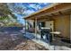 Covered patio with grill and storage cabinet at 3610 Mount Charleston Dr, Pahrump, NV 89048