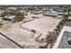 Aerial view of riding arena with stables and surrounding fencing at 5901 W Washburn Rd, Las Vegas, NV 89130