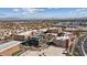 Modern building with rooftop and surrounding commercial areas at 120 Los Cabos Dr # 301, Las Vegas, NV 89144