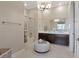 Bathroom with tub, double vanity, and stylish decor at 120 Los Cabos Dr # 301, Las Vegas, NV 89144