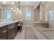 Spa-like bathroom with a large walk-in shower and a double vanity at 120 Los Cabos Dr # 301, Las Vegas, NV 89144