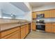 Kitchen features stainless steel appliances and wood cabinets at 45 Maleena Mesa St # 1711, Henderson, NV 89074