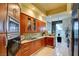 Modern kitchen with stainless steel appliances and granite counters at 2877 Paradise Rd # 104, Las Vegas, NV 89109