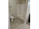 Clean bathroom with a shower/tub combo and tile floors at 1509 Blackcombe St # 101, Las Vegas, NV 89128