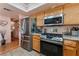 Stainless steel appliances and granite countertops highlight this kitchen at 344 Dockside Ct, Las Vegas, NV 89145