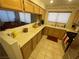 Kitchen features light wood cabinets and stainless steel appliances at 2211 Rugged Mesa Dr, Laughlin, NV 89029