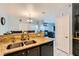 Well-equipped kitchen with granite counters, double sink, and ample cabinetry at 6405 Angel Mountain Ave, Las Vegas, NV 89130