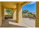 Covered patio with view of the community landscaping at 6405 Angel Mountain Ave, Las Vegas, NV 89130