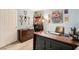 Bright home office with a desk and ample storage at 6405 Angel Mountain Ave, Las Vegas, NV 89130