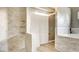 Spa-like bathroom with a soaking tub and walk-in shower at 10675 Haven St, Las Vegas, NV 89183