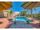 Enjoy this refreshing pool with patio seating and umbrellas for shade at 6527 Lokai Ave, Las Vegas, NV 89130