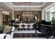 Formal dining room with large chandelier and wooden table at 2323 Pinto Ln, Las Vegas, NV 89107