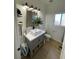 Modern bathroom with gray vanity and white subway tile at 1660 Princeton Cir, Pahrump, NV 89060