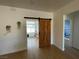 Open hallway with a rustic barn door leading to another room at 1660 Princeton Cir, Pahrump, NV 89060