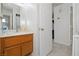 Bathroom with vanity, mirror, and access to other rooms at 2220 Highpointe Dr # 102, Laughlin, NV 89029