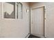 Unit entryway with beige door and small window at 2220 Highpointe Dr # 102, Laughlin, NV 89029