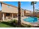 Relaxing kidney-shaped pool and patio area at 271 Single Petal St, Henderson, NV 89074