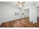 Spacious bedroom with hardwood floors and mirrored closet at 8127 Dolce Volpe Ave, Las Vegas, NV 89178