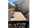 Relaxing paved patio with seating area adjacent to the home at 2121 Cold Canyon Ave, North Las Vegas, NV 89086