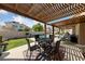 Peaceful patio with pergola, ideal for dining al fresco at 8713 W Gilmore Ave, Las Vegas, NV 89129